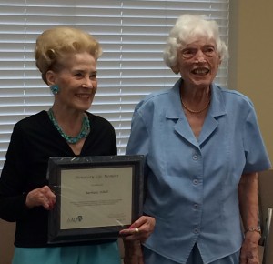 Barbara Asbell, left, with her Lifetime  Award, and Eleanor Granum, right.